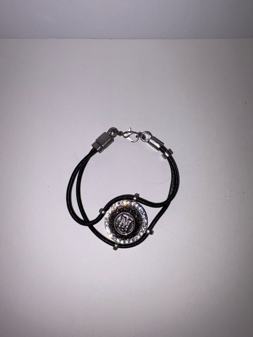 Black Leather Multi-Strand “M” Bracelet with Crystal-Stud Button